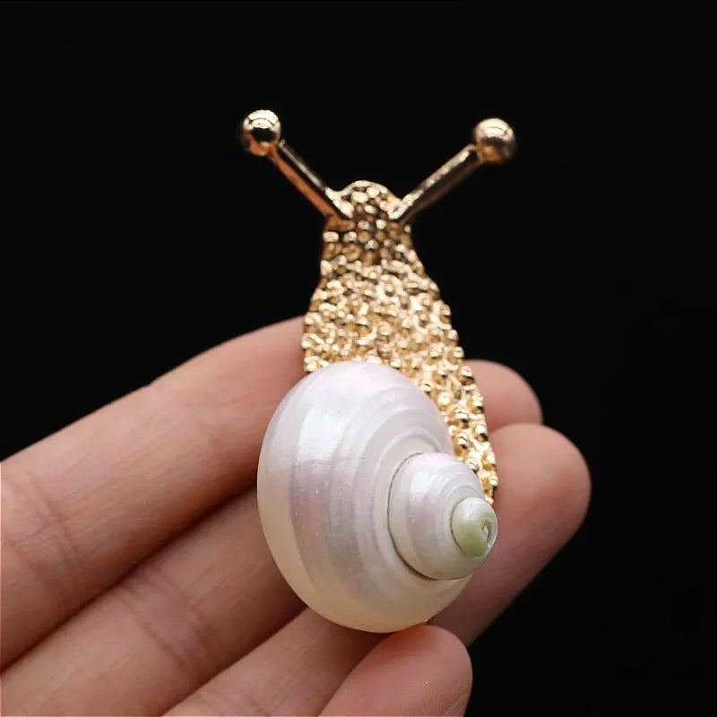 Broche Caracol IV Dourado