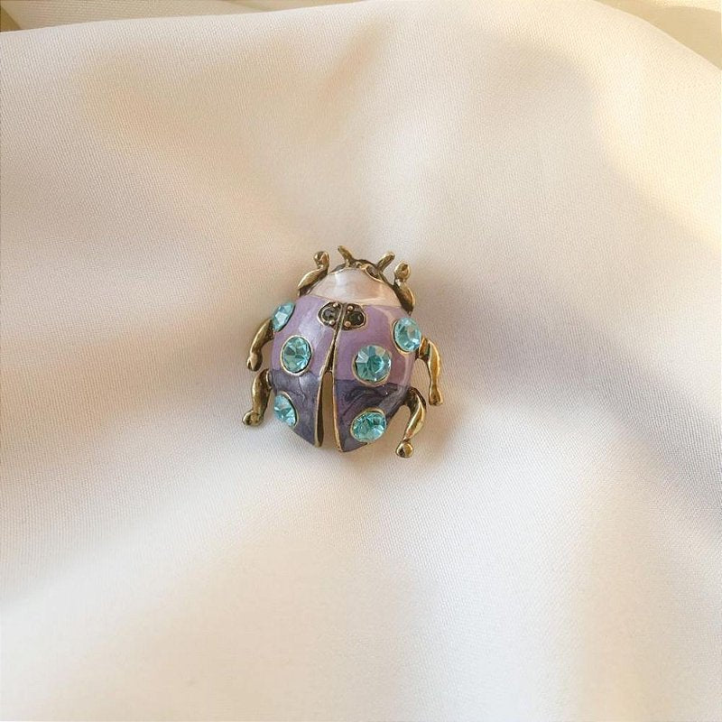 Broche Iná