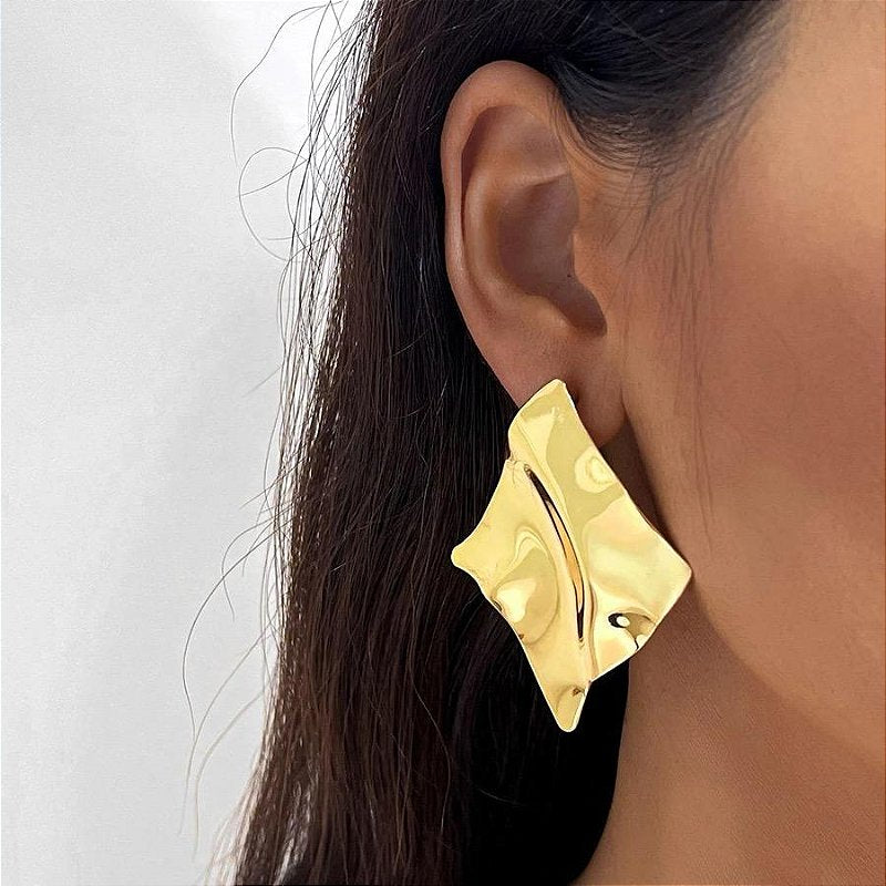 Brinco El Salvador Dourado