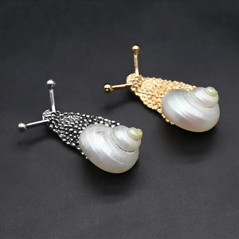 Broche Caracol IV Dourado